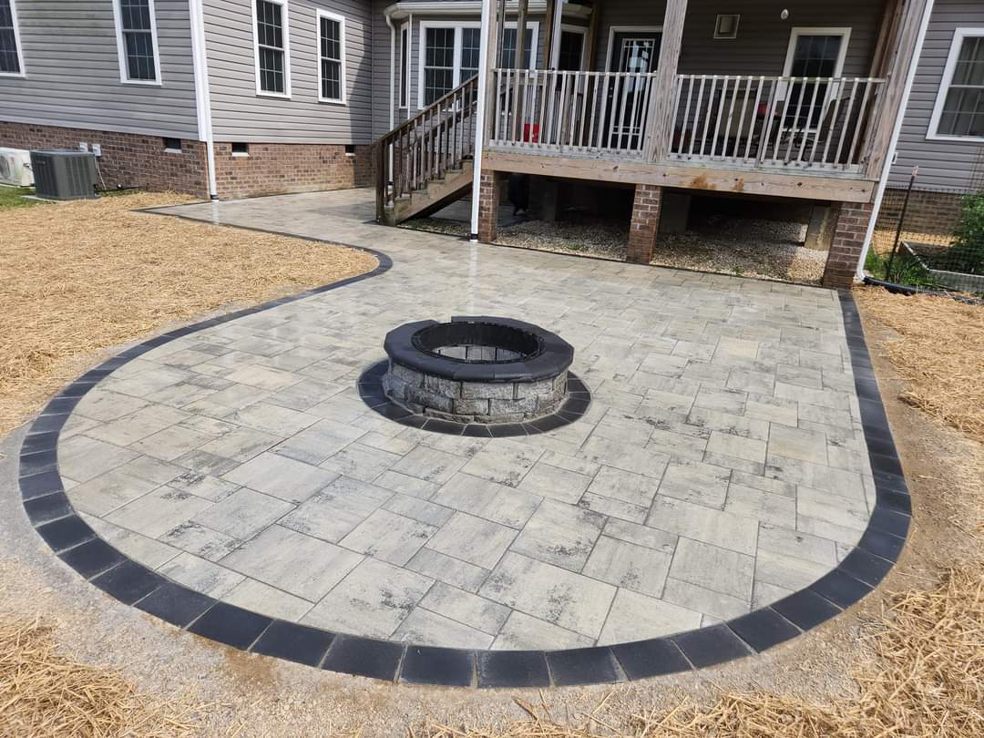 New concrete walkway with fire pit